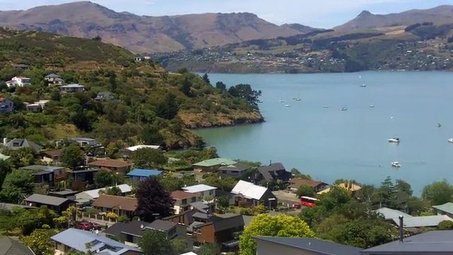 Aerial landscape view of Lyttelton inner harbour and township near Christchurch, New Zealand.
