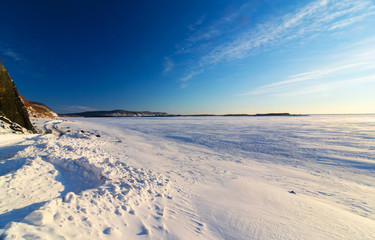 Frosty winter day on the river Amur. Russian Far East.