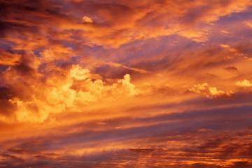 Vivid clouds with many colors around sunset/sunrise.