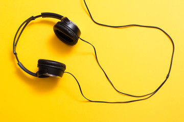 Headphones on yellow