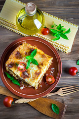 Italian lasagna, pasta dish with minced meat and parmesan cheese - 98493669