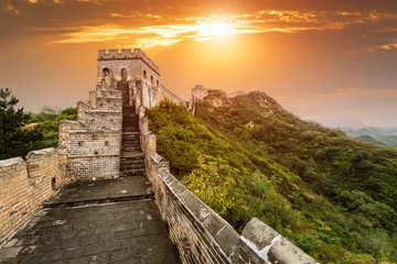 Papier Peint photo autocollant Mur chinois The magnificent Great Wall of China at sunset