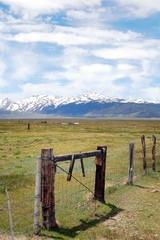 Sierra nevada snow mountains with farming fields