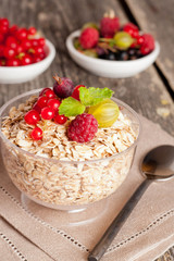 fresh foods for a healthy breakfast on the wooden background