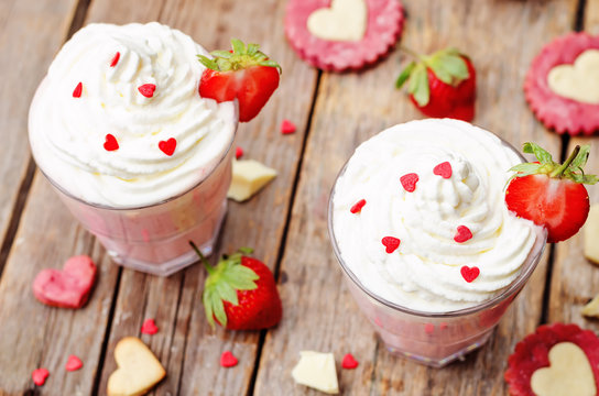 Strawberry hot white chocolate with whipped cream and strawberri