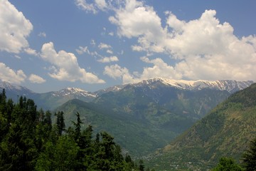 Blue sky with clouds background in mountains. Himalai, India