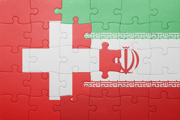 puzzle with the national flag of switzerland and iran