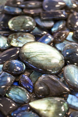 Texture of  colorful labradorite gem stones.