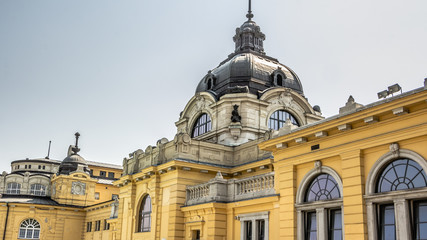 Fototapeta na wymiar Exterior of the Szechenyi Baths in Budapest in Hungary. The biggest spa in Europe.