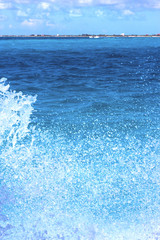 wave    mexico froath and blue  foam