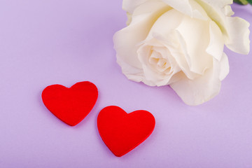 Obraz na płótnie Canvas hearts and a pink roses, Valentines Day background.
