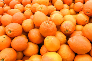 Colorful Display Of Oranges In Fruit Market