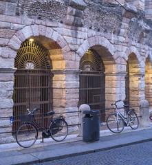 Fototapeta na wymiar parked bicycles near the old theater in Verona in Italy