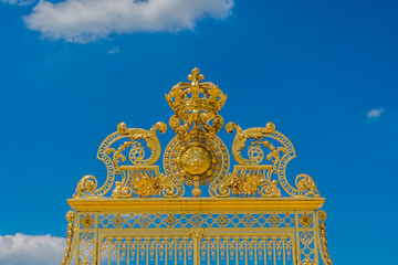 Fototapeta na wymiar Golden Main Gates of Versailles Palace. France.