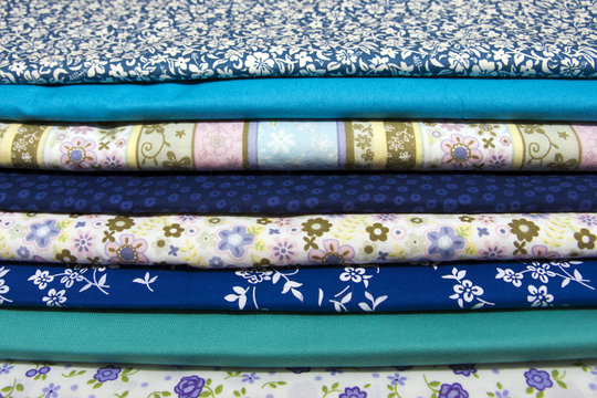 Pile of blue cotton fabrics