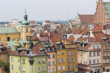 Obraz premium Old town in Warsaw, Poland. The Royal Castle and Sigismund's Col
