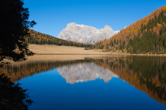 Reflections on water, autumn panorama from mountain lake © elleonzebon