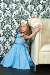 Girl and leather sofa