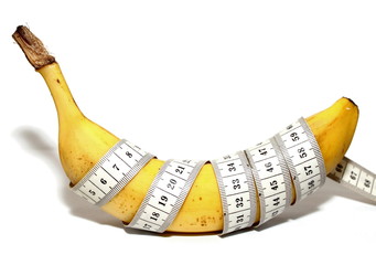 Large banana and measuring tape Isolated on white background, such as man's large penis, big size