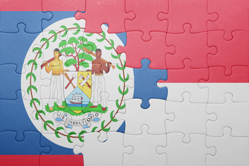 puzzle with the national flag of indonesia and belize