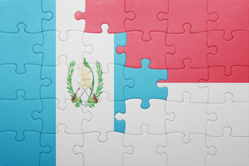 puzzle with the national flag of indonesia and guatemala