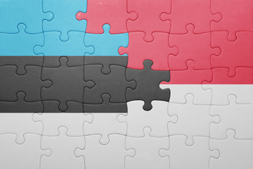 puzzle with the national flag of indonesia and estonia