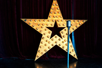Star, microphone, stage