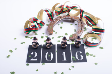Fototapeta na wymiar card concept for happy new year with horseshoe
