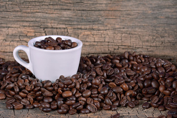Coffee beans in a cup