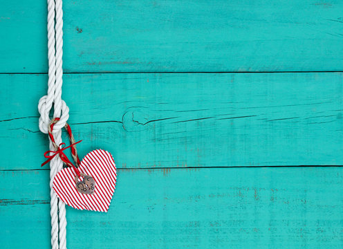 Blank teal blue sign with rope border and red heart