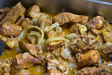cooked fried pork ribs on tray, nicaragua cuisine