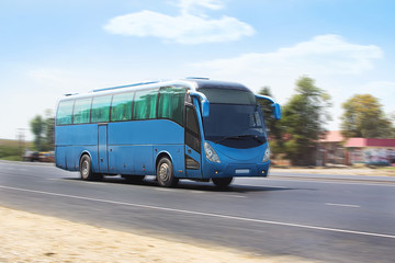 tourist bus goes on the highway