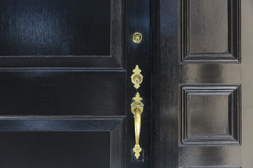 front door, close up of black front door with brass handle