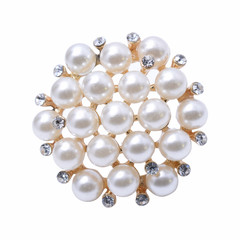 round brooch with pearls isolated on white