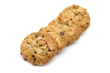 Oatmeal cookies with cranberries on a white background.
