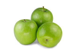 Three isolated green apples on white background