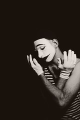 Portrait of sad mime