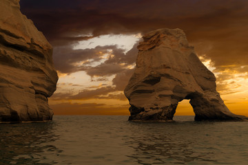 Caves and rock formations by the sea at Sarakiniko area on Milos