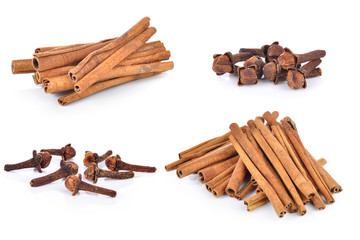 Spice cloves and cinnamon on white background