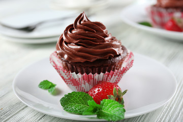 Chocolate cupcakes on plate closeup