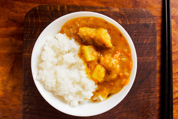 Directly above shot of rice and pork curry 