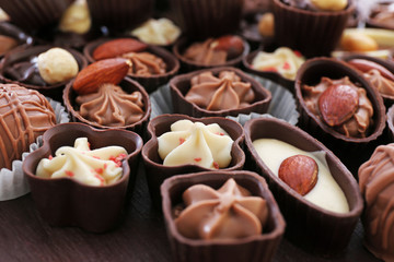 Delicious chocolate candies background, close up