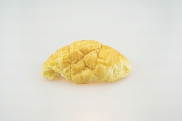 Fresh and tasty croissant on white background 
