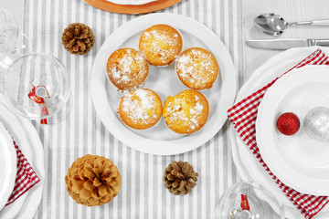 Christmas table setting with holiday decorations