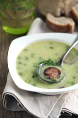 Green pea soup with sausage
