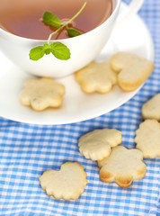 Cup of tea and sugar cookies