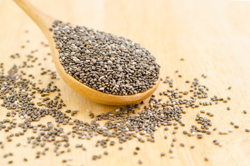 Chia seed in wooden spoon.