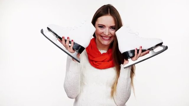 Woman with ice skates getting ready for ice skating 4K