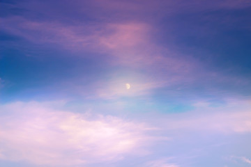 Naklejka na ściany i meble Moon on colorful sunset. Toned image.