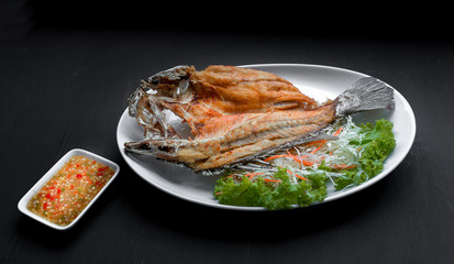Fish dish - Dee[ fried Snapper fish eat with spicy sauce
